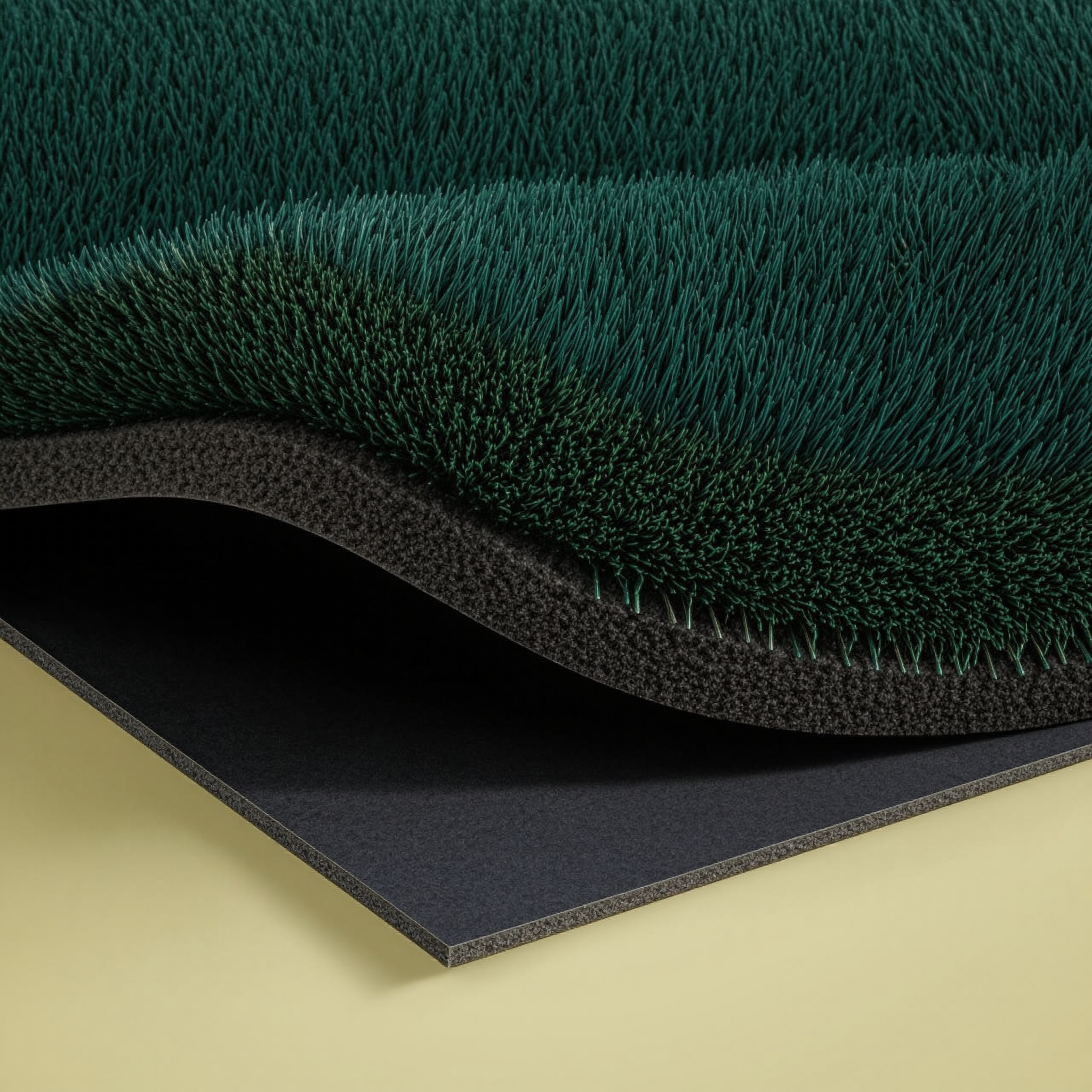 Synthetic turf fringe and rubber base detail of the putting green