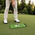 Golf Practice Mat with Swing Path Track — in use