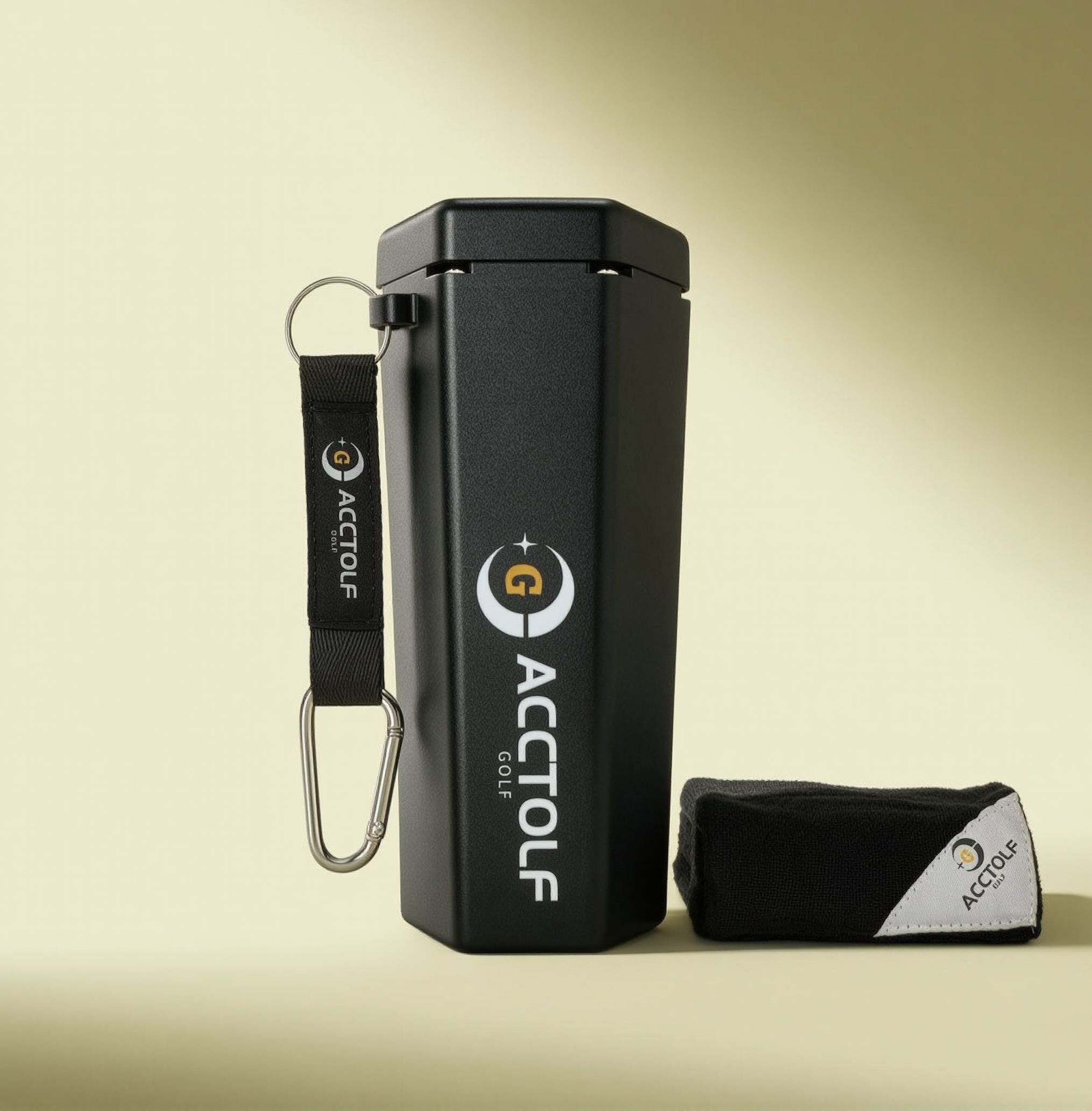 Portable black golf ball cleaner with clip and towel