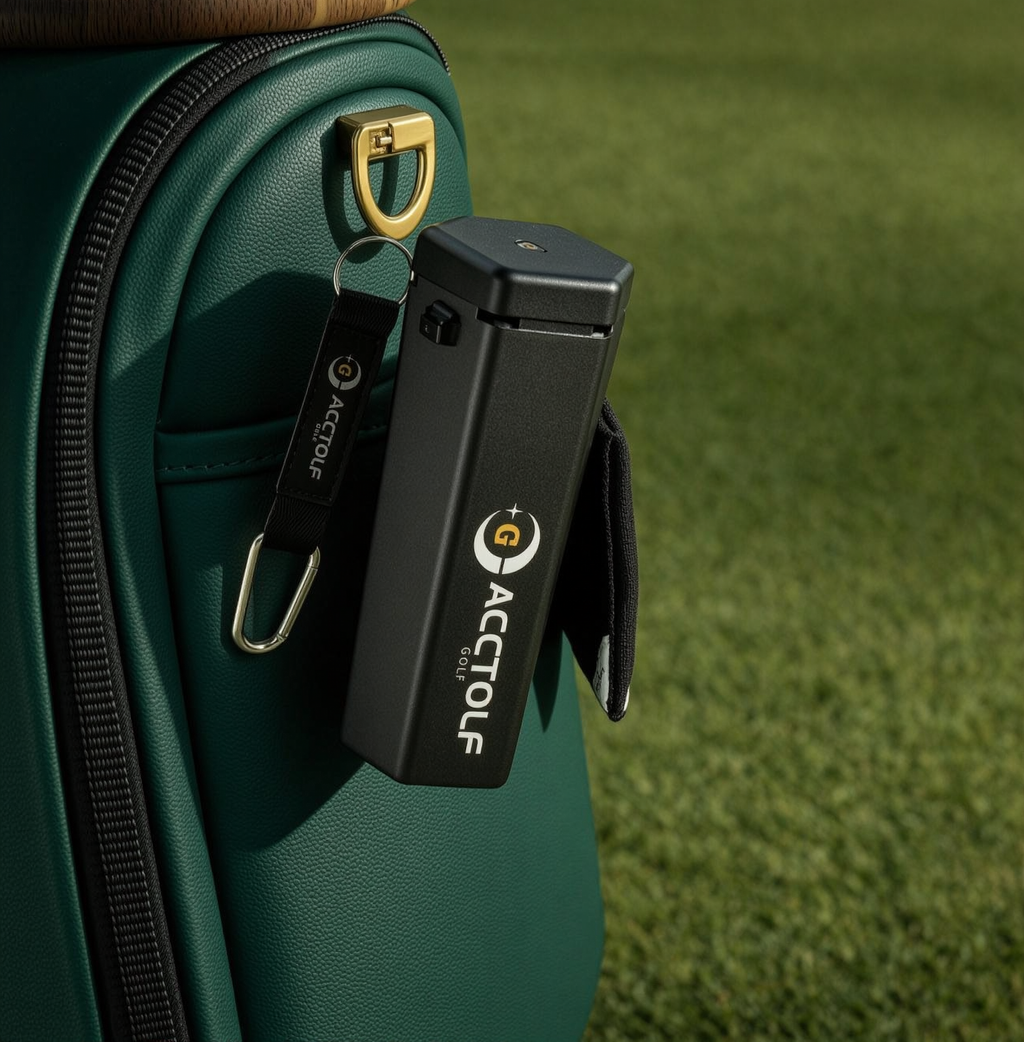 Golf ball cleaner clipped to a golf bag on the course