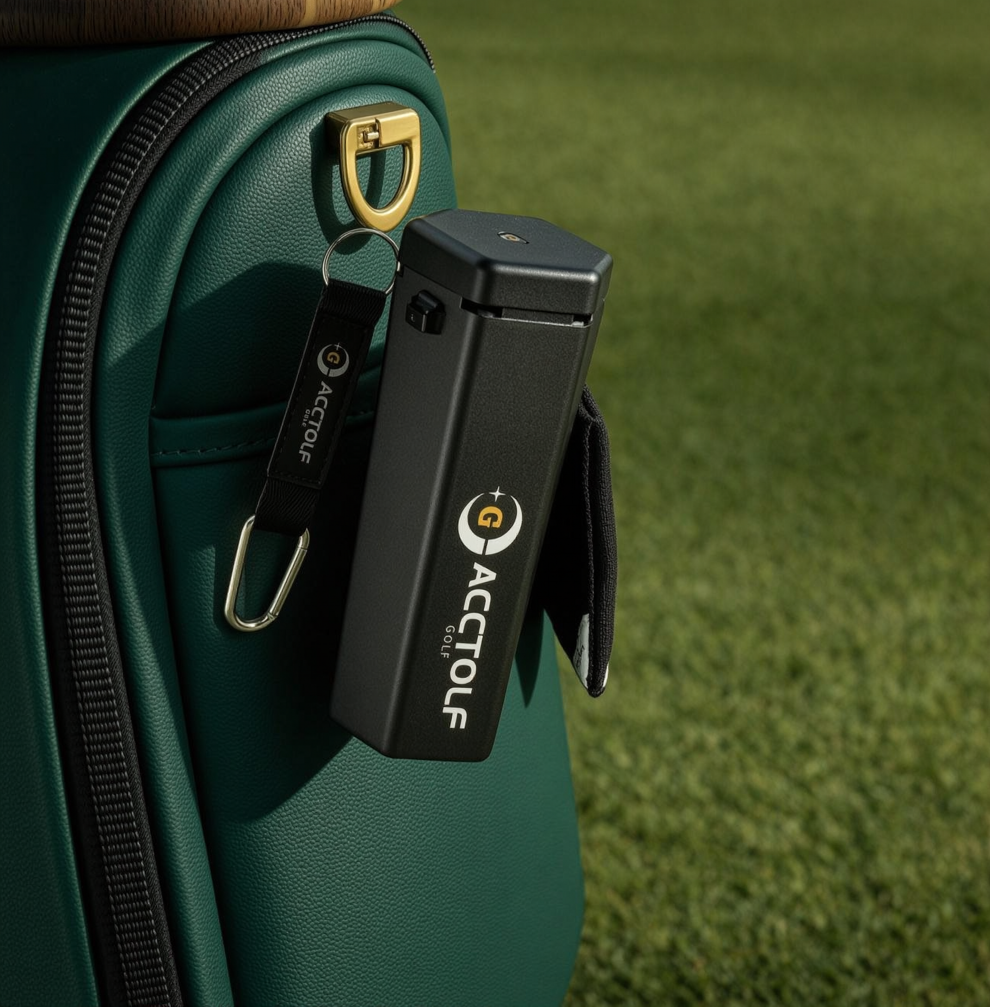Golf ball cleaner clipped to a golf bag on the course