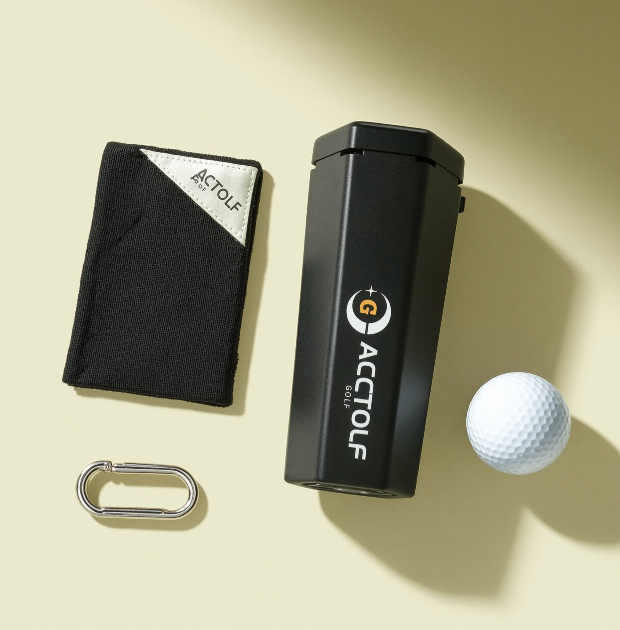 Portable golf ball cleaner components arranged on an ivory background